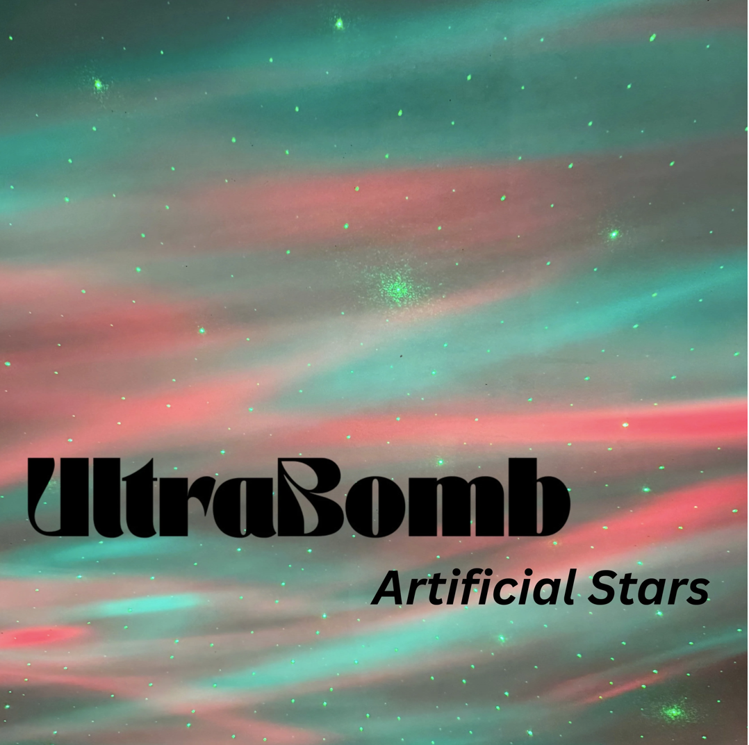 A smeared pink and teal background alogn with scattered points of green light.