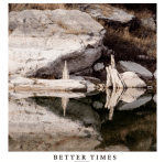 an image of a still body of water in front of a rocky coast