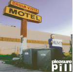A blindfolded woman sits on top of an electrical power box outside an old motel with a tall sign.