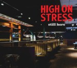 A photo of empty booths in a dark restaurant or bar setting.